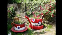 decorações de jardim feitas com pneus velhos